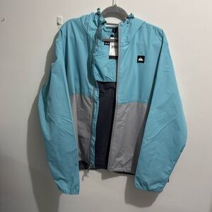 Brand new Quiksilver wind breaker jacket, never worn, tags still attached.